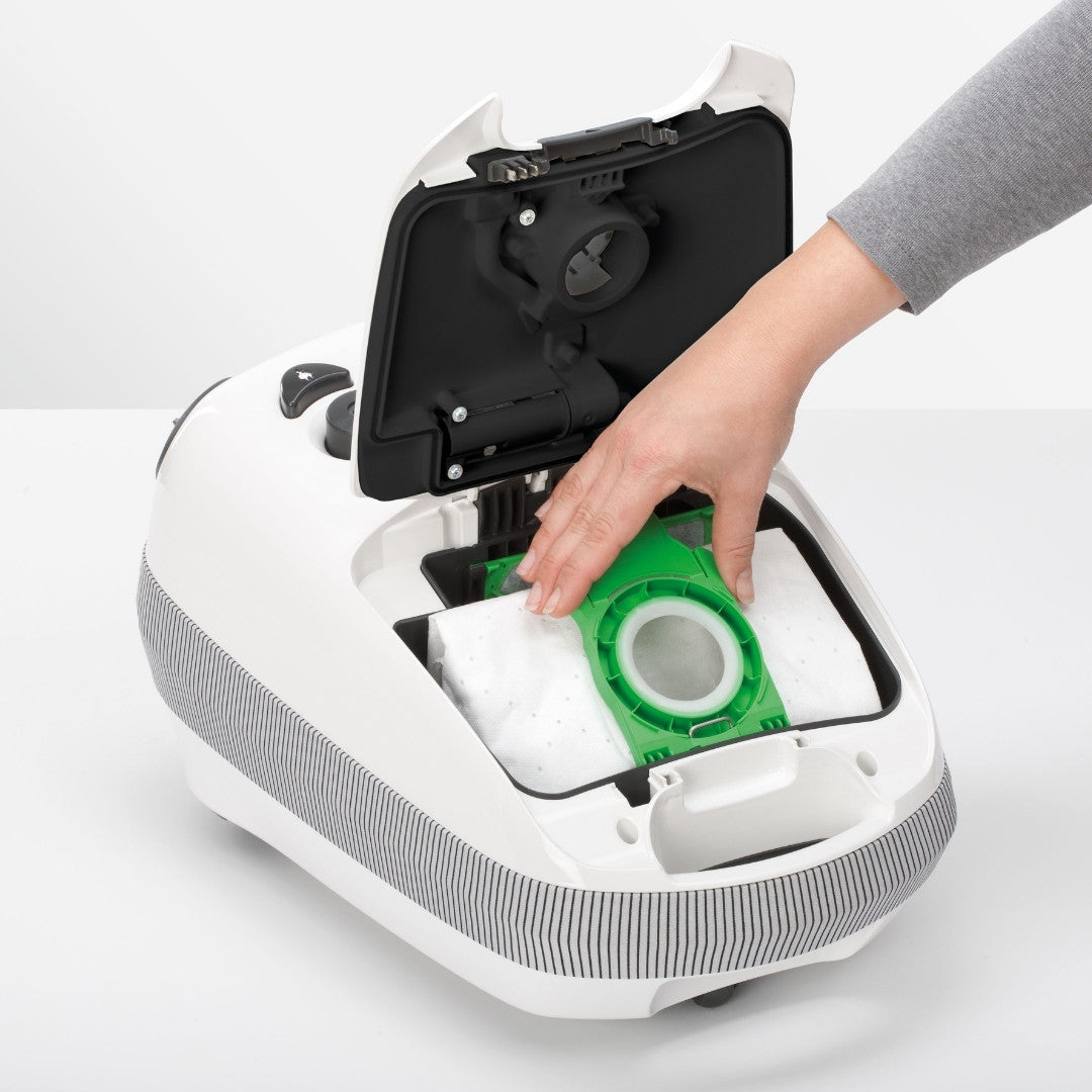 SEBO E1/E2/E3 bag fitted in a compatible vacuum; vacuum shown for fitment only